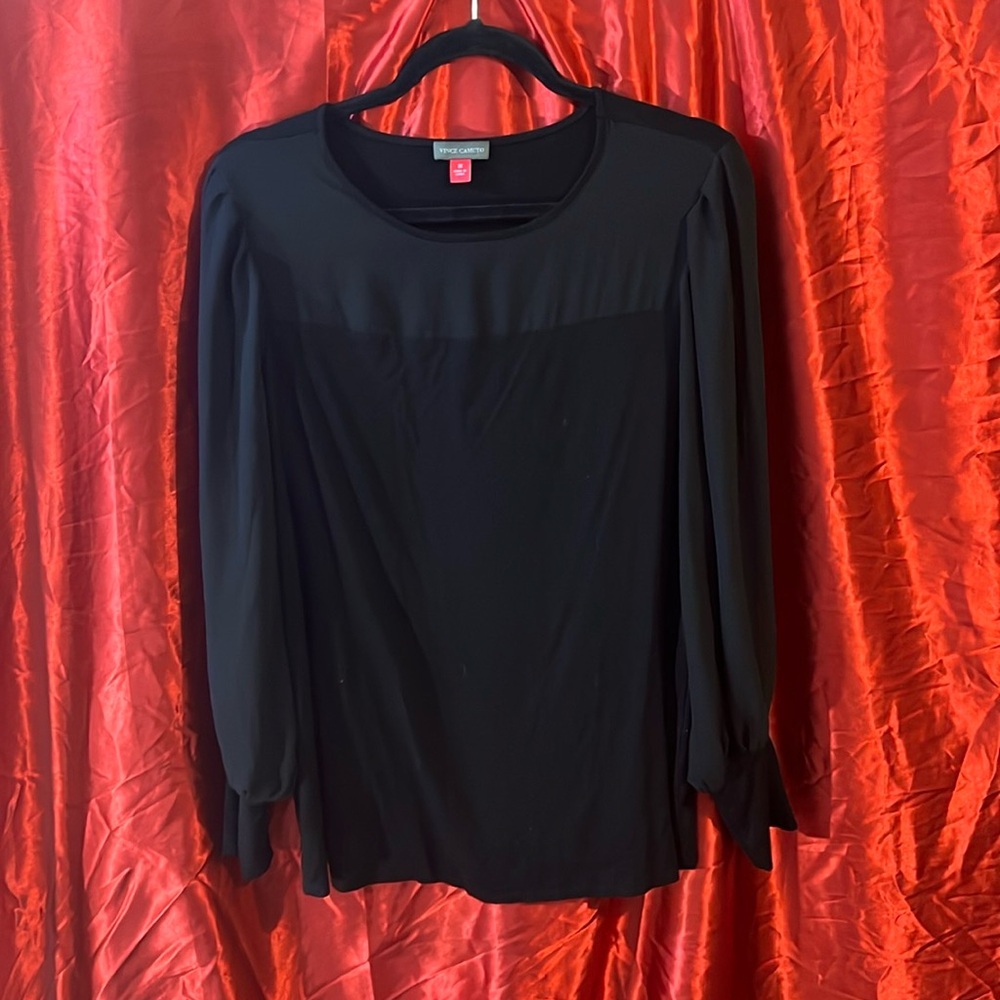 A black sheer plus size dressy top